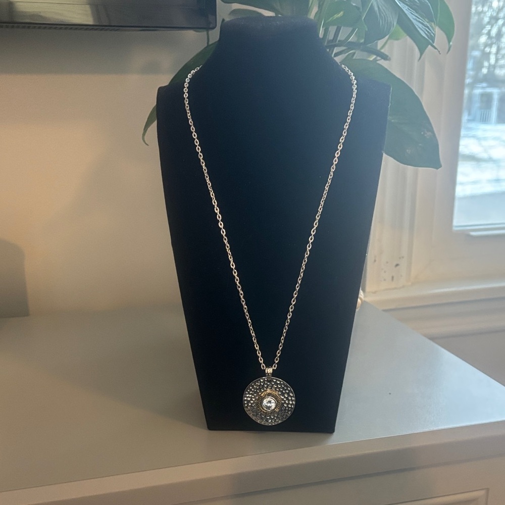 Silver Pendant Necklace with large faux diamond and gold trim.